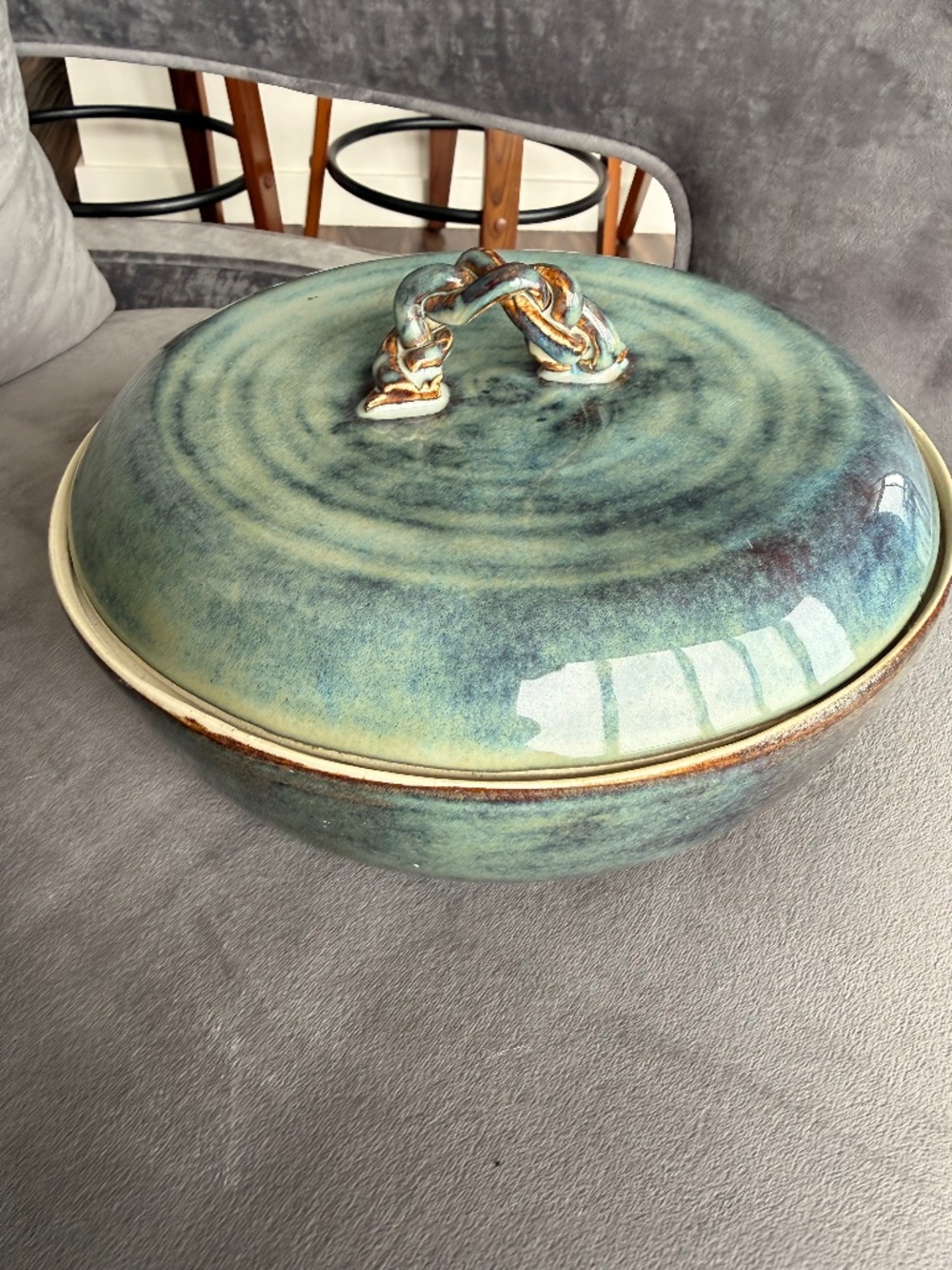 Ceramic oven safe pot with lid.